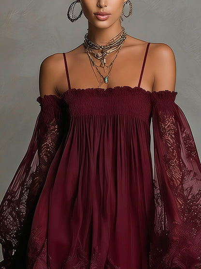 Noemi • Vestido mini en chiffon azul marino con escote de hombros descubiertos, borde de encaje y mangas transparentes
