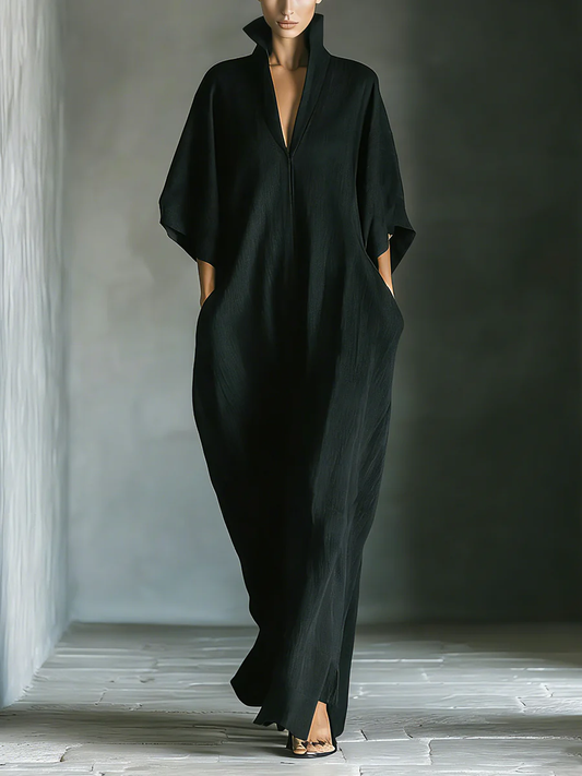 Alessandra • Vestido largo negro oversize minimalista con mangas de kimono