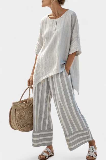 Talvora | Elegante Blusa Asimétrica y Pantalones a Rayas