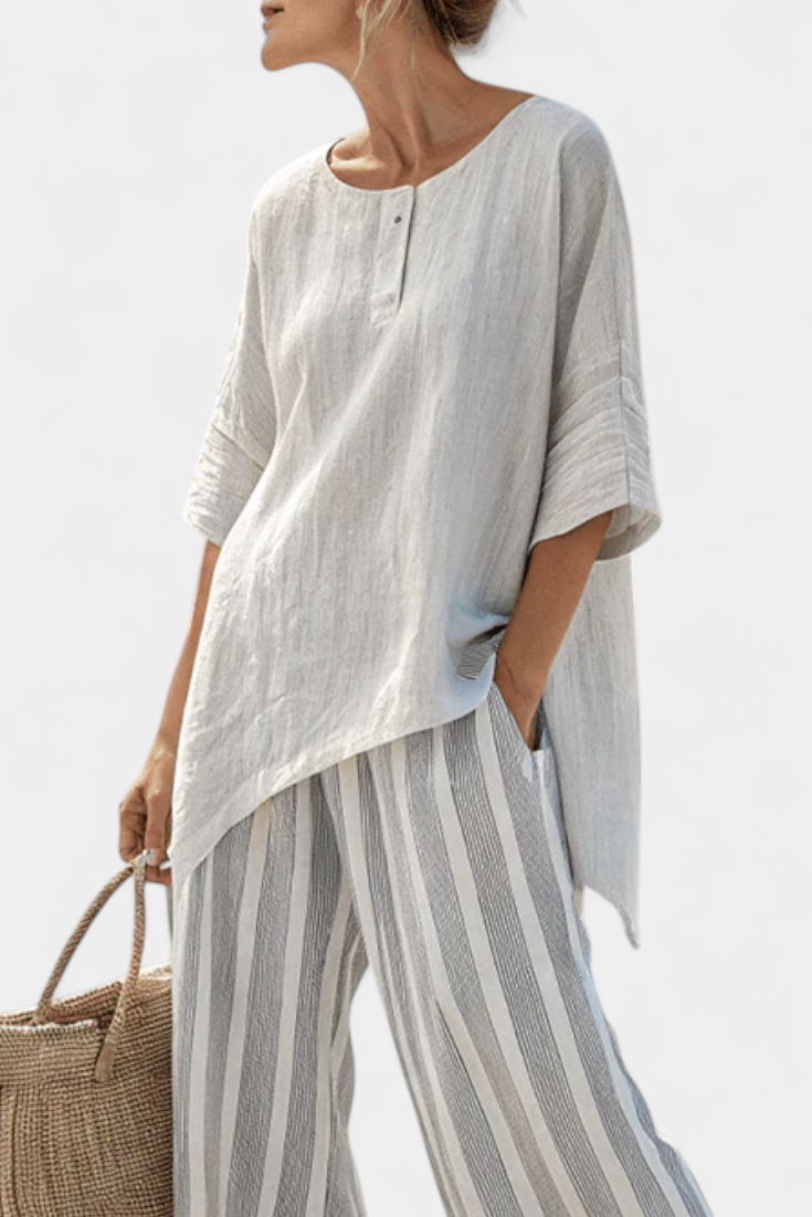 Talvora | Elegante Blusa Asimétrica y Pantalones a Rayas
