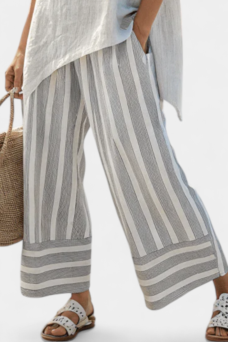 Talvora | Elegante Blusa Asimétrica y Pantalones a Rayas