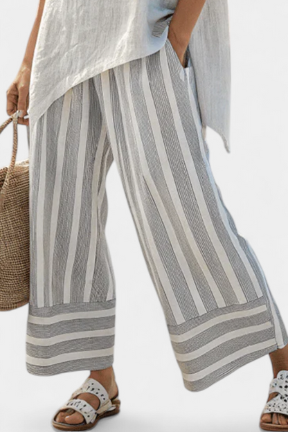 Talvora | Elegante Blusa Asimétrica y Pantalones a Rayas