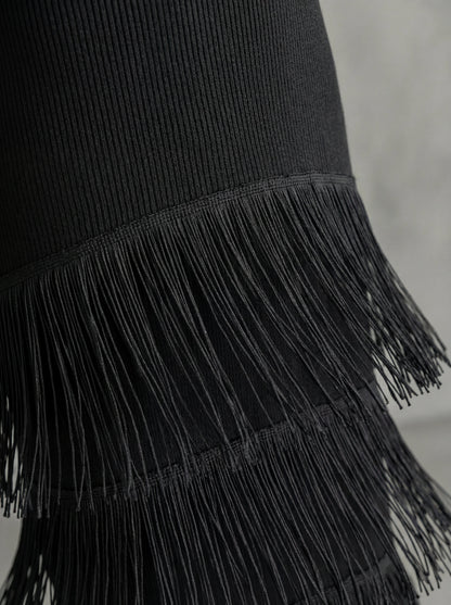 Odette · Vestido largo de espalda descubierta con hombros anchos